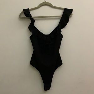 Black body suit from ASTR the label size small